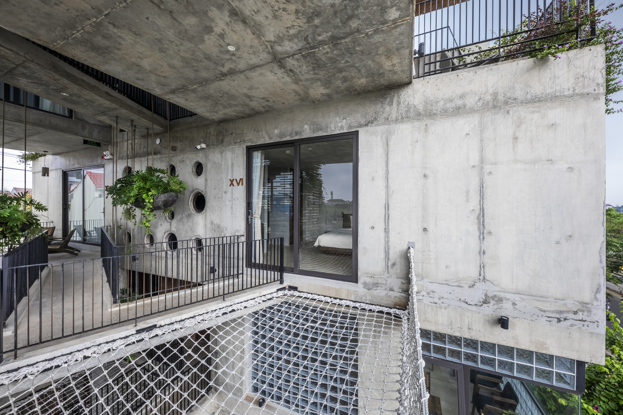 图片[8]|渔网连接悬浮水泥盒，Thalia 精品酒店 / Ho Khue Architects|ART-Arrakis | 建筑室内设计的创新与灵感