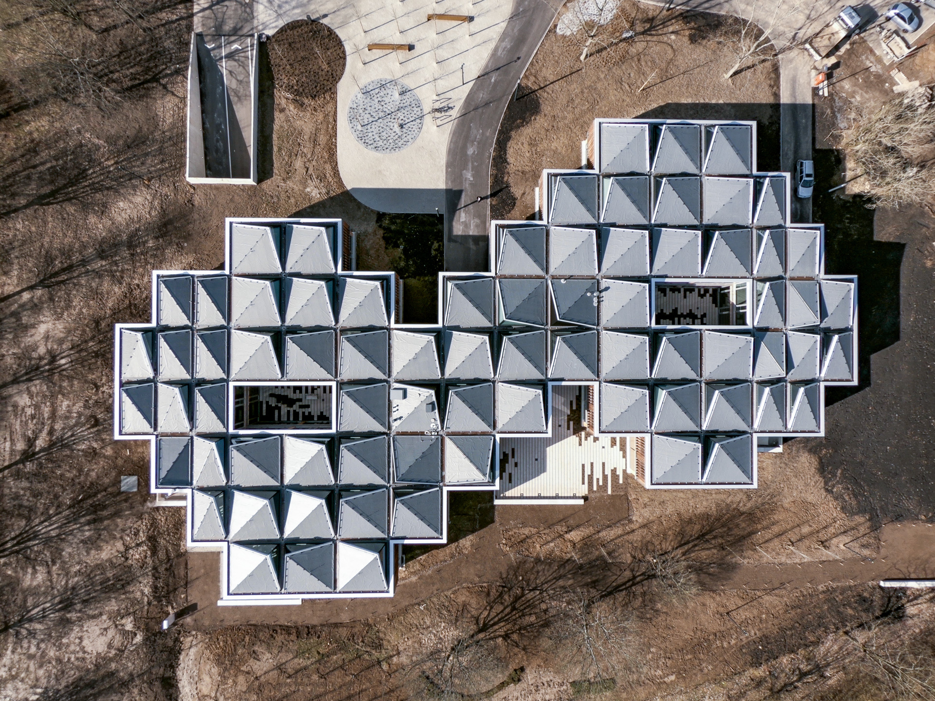 褶皱屋顶，德国国际合作学院 / Waechter + Waechter Architekten|ART-Arrakis | 建筑室内设计的创新与灵感